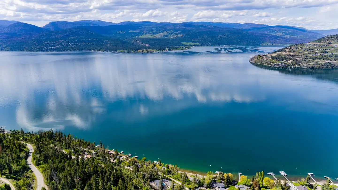 Aerial view of Okanagan Lake and the surrounding hills